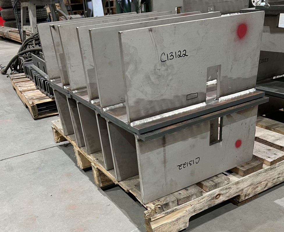 Steel assemblies with identifying marks